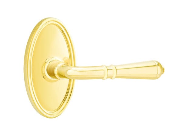 Emtek Turino Lever with Oval Rosette in Unlacquered Brass
